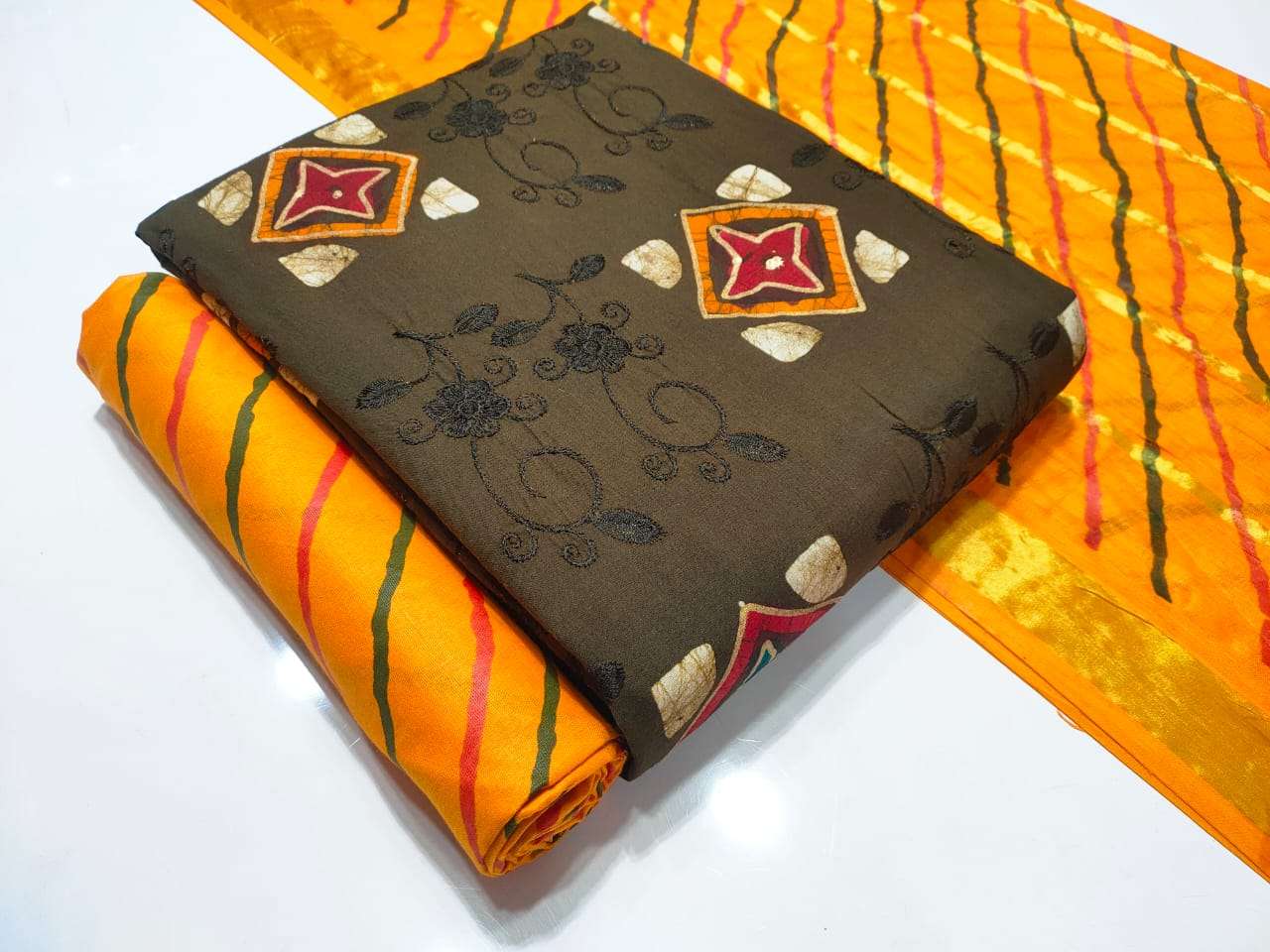 Nemi Wax Batik Leriyu Gold With Work Vol-6 Pure Cotton With Embroidery suit