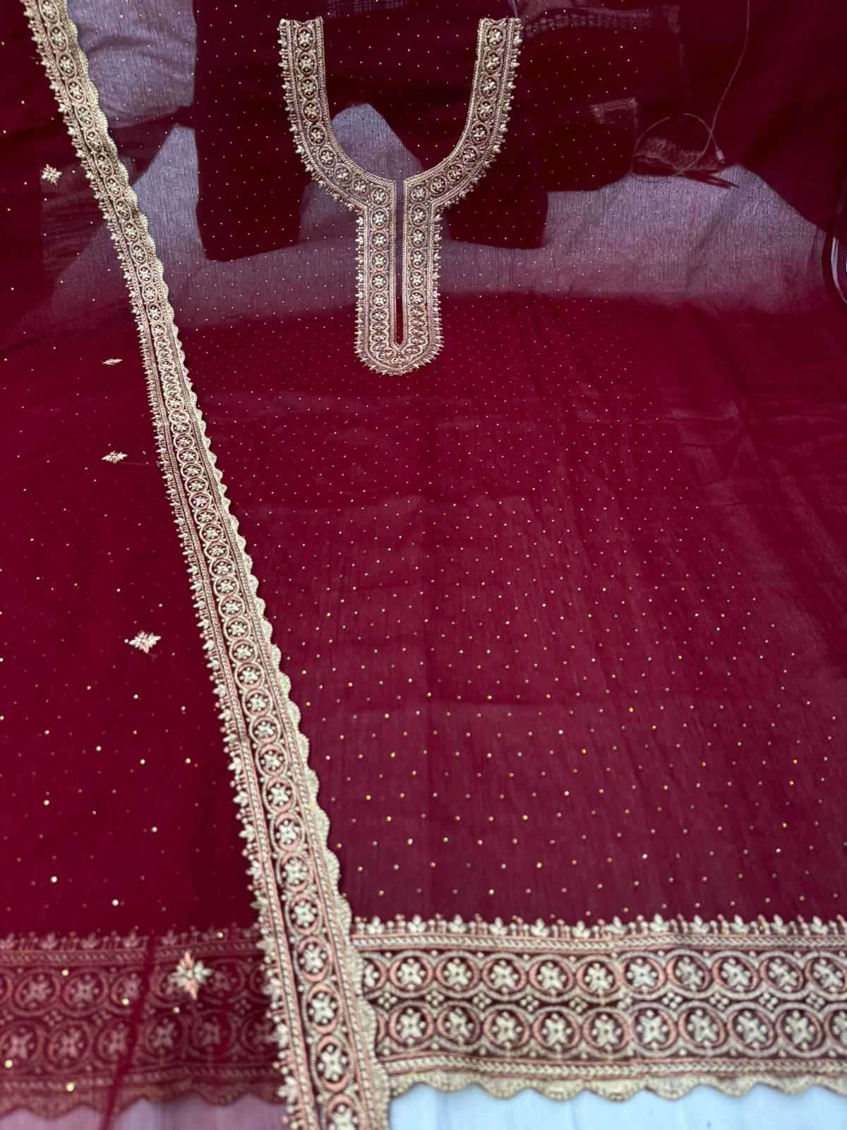 pr reena Pure shimmer swaroski over embroidery suit