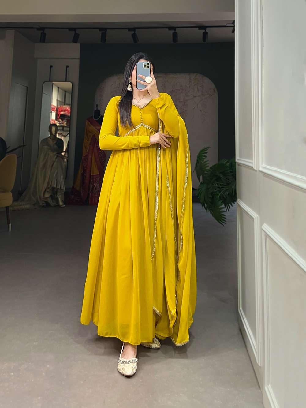 the signature of Georgette Alia style gowns