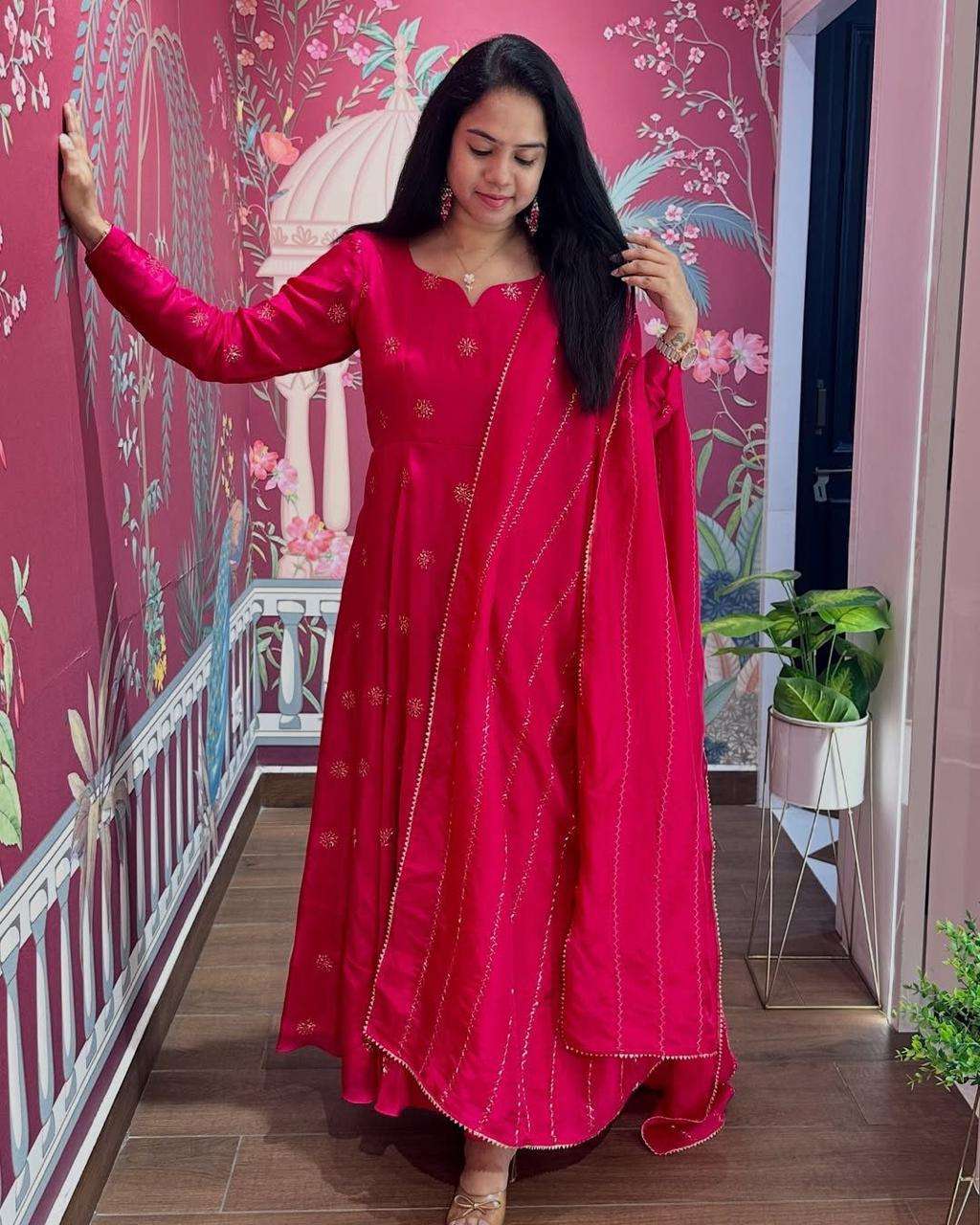 A beautiful traditional Indian outfit in a deep shade