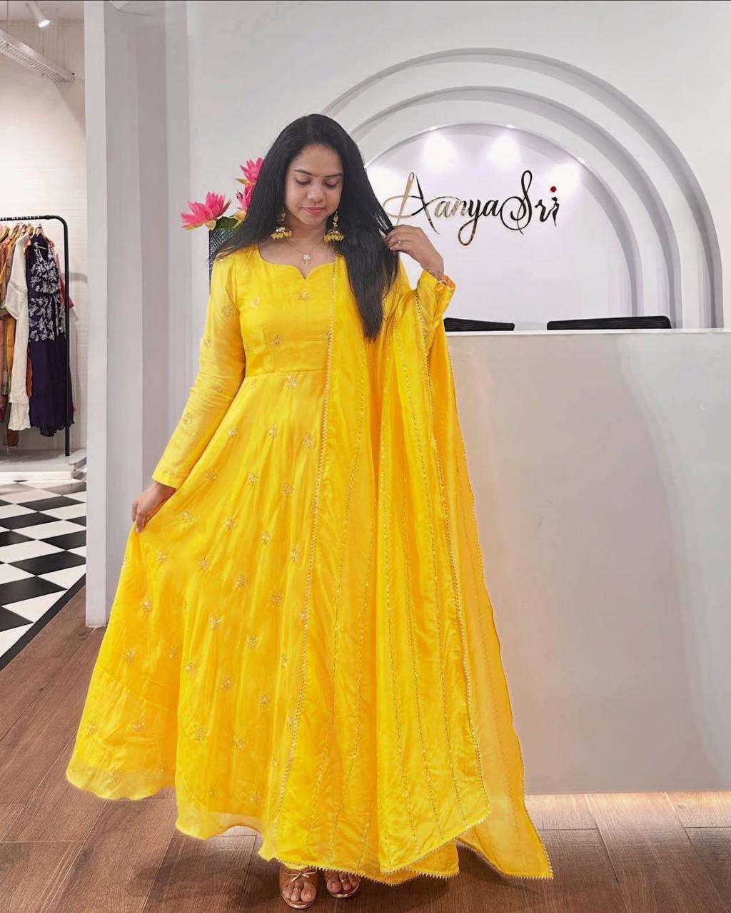 aanyasai the outfit consists of a long Anarkali-style kurti and a matching dupatta.