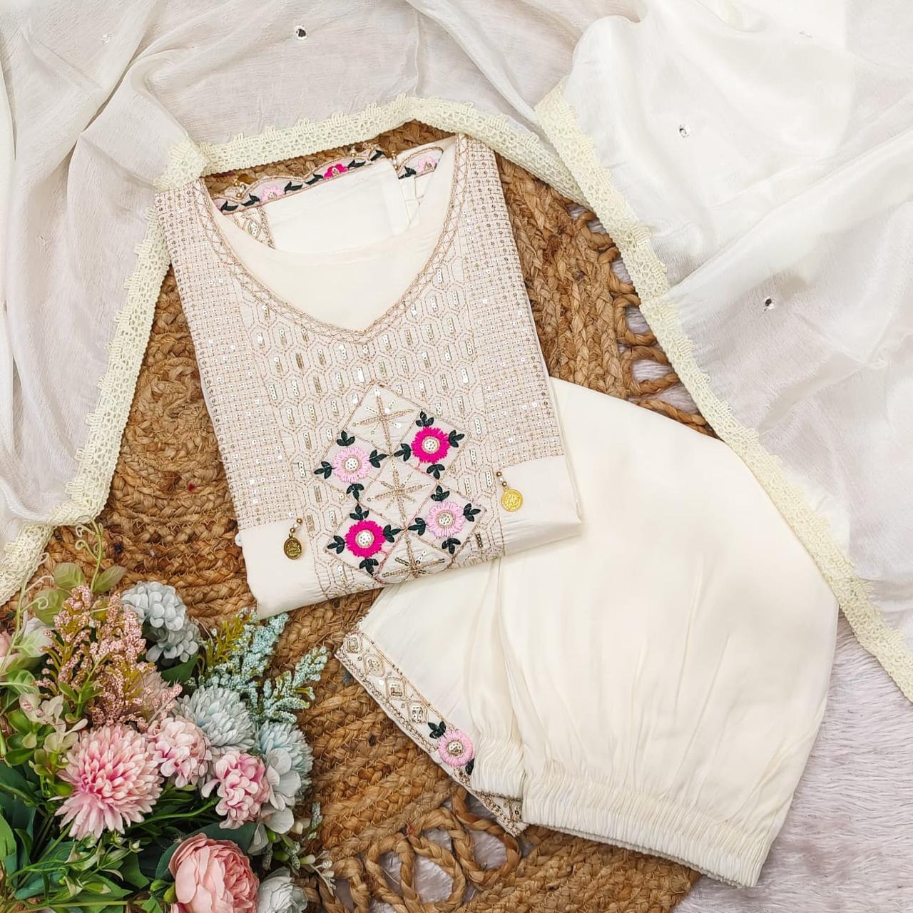 Featuring beautifully Crafted Pure Roman Silk Suits in beautifulColours