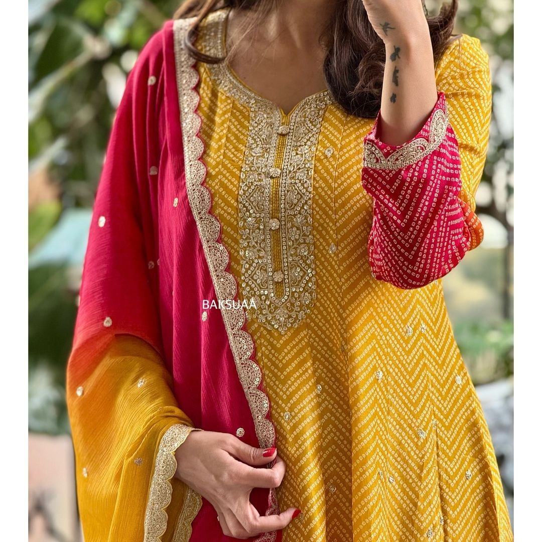 mbroidery designs are likely floral or paisley-inspired wholesale kurti 