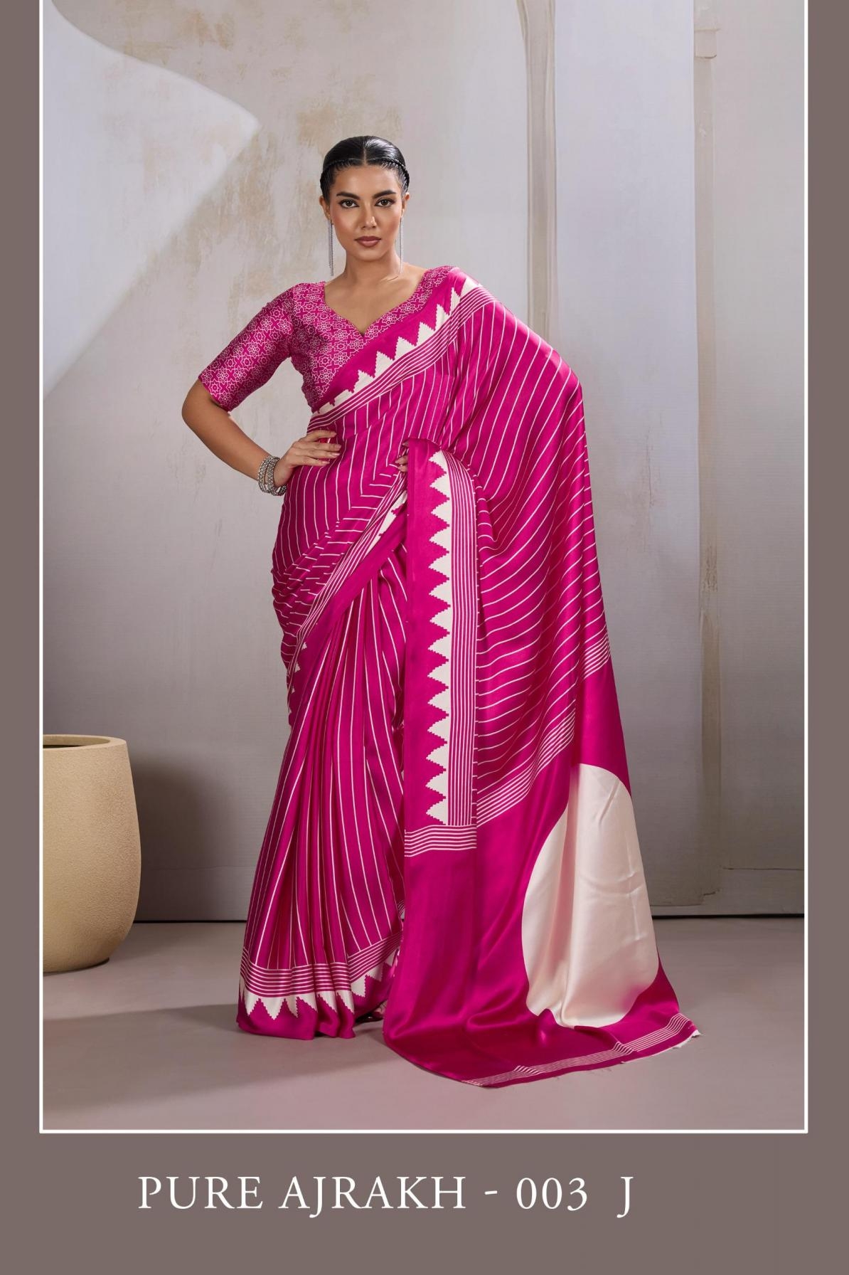 rajtex launch pure ajrakh nx series 003 A TO 003 L modal satin pretty look saree in wholesale surat