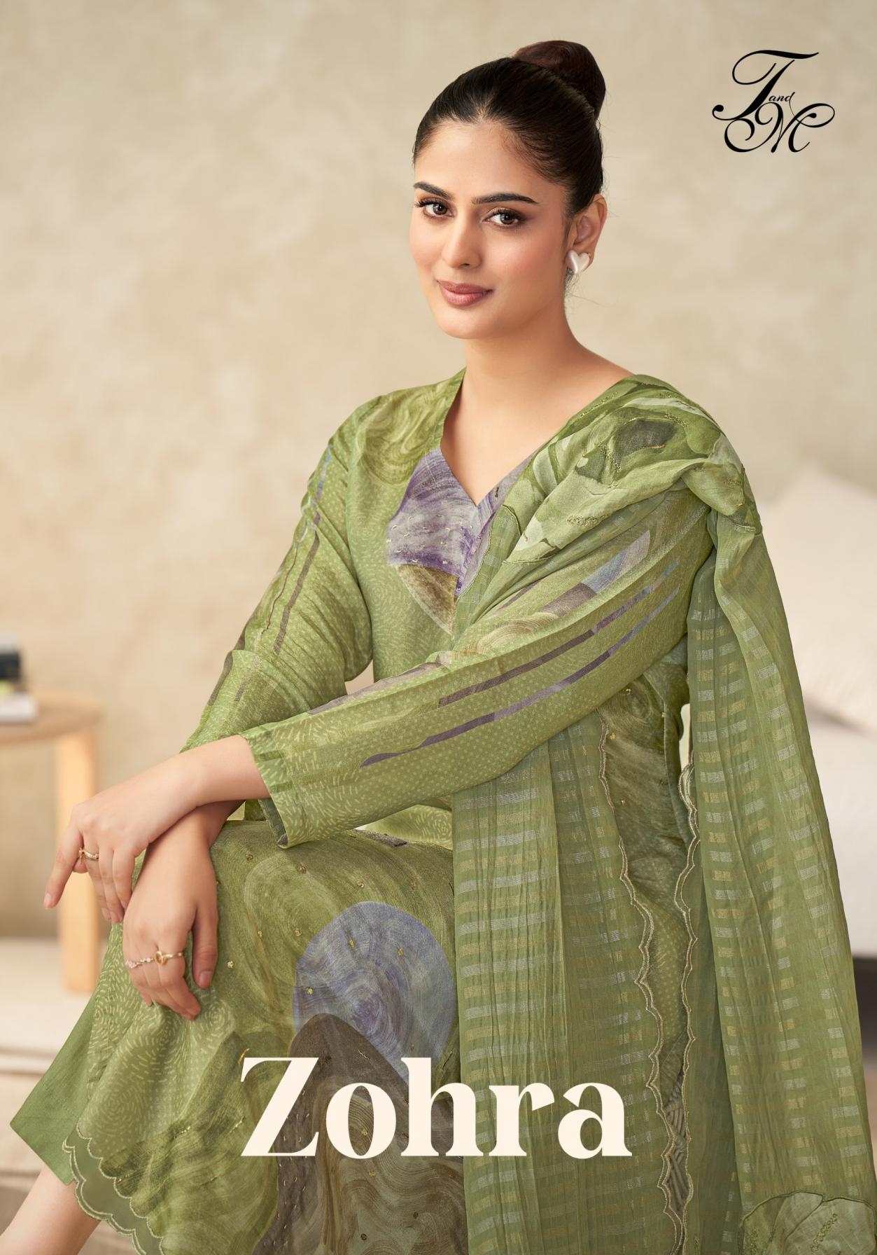 t&m zohra series 371 to 355 popular simmer tissue salwar kameez in wholesale surat