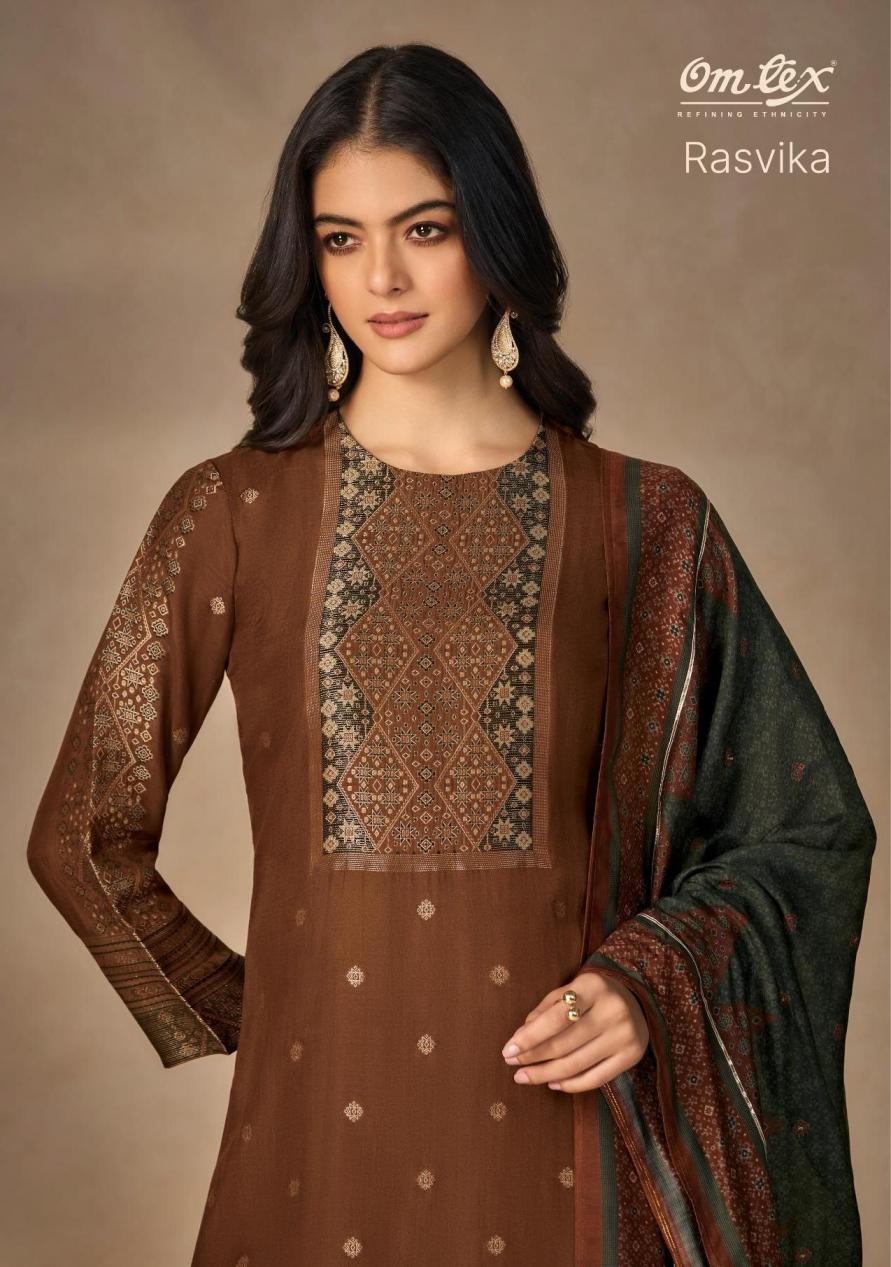 omtex rasvika series 8231A to 8231D muslin jacquard hit design suit in wholesale surat