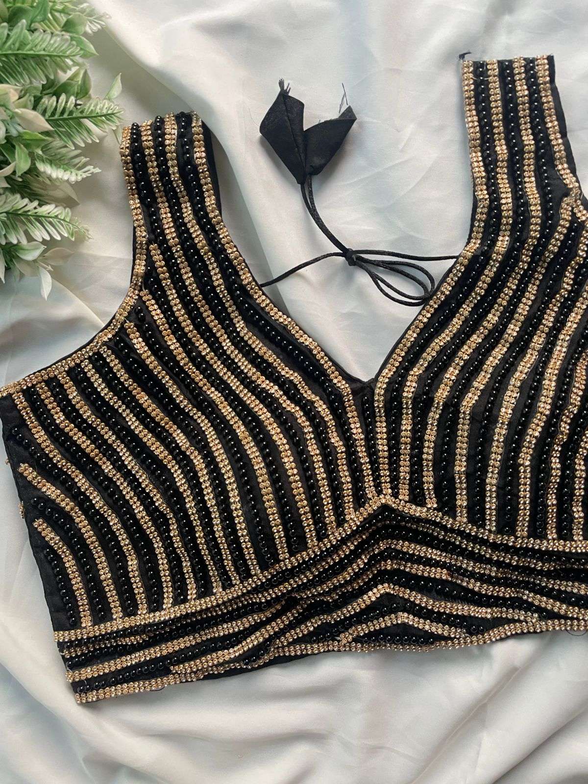 HKS  FASHION Beautiful Pearl Moti Spaghetti Fancy Sleeves Less Handcuffed Blouse in wholesale surat