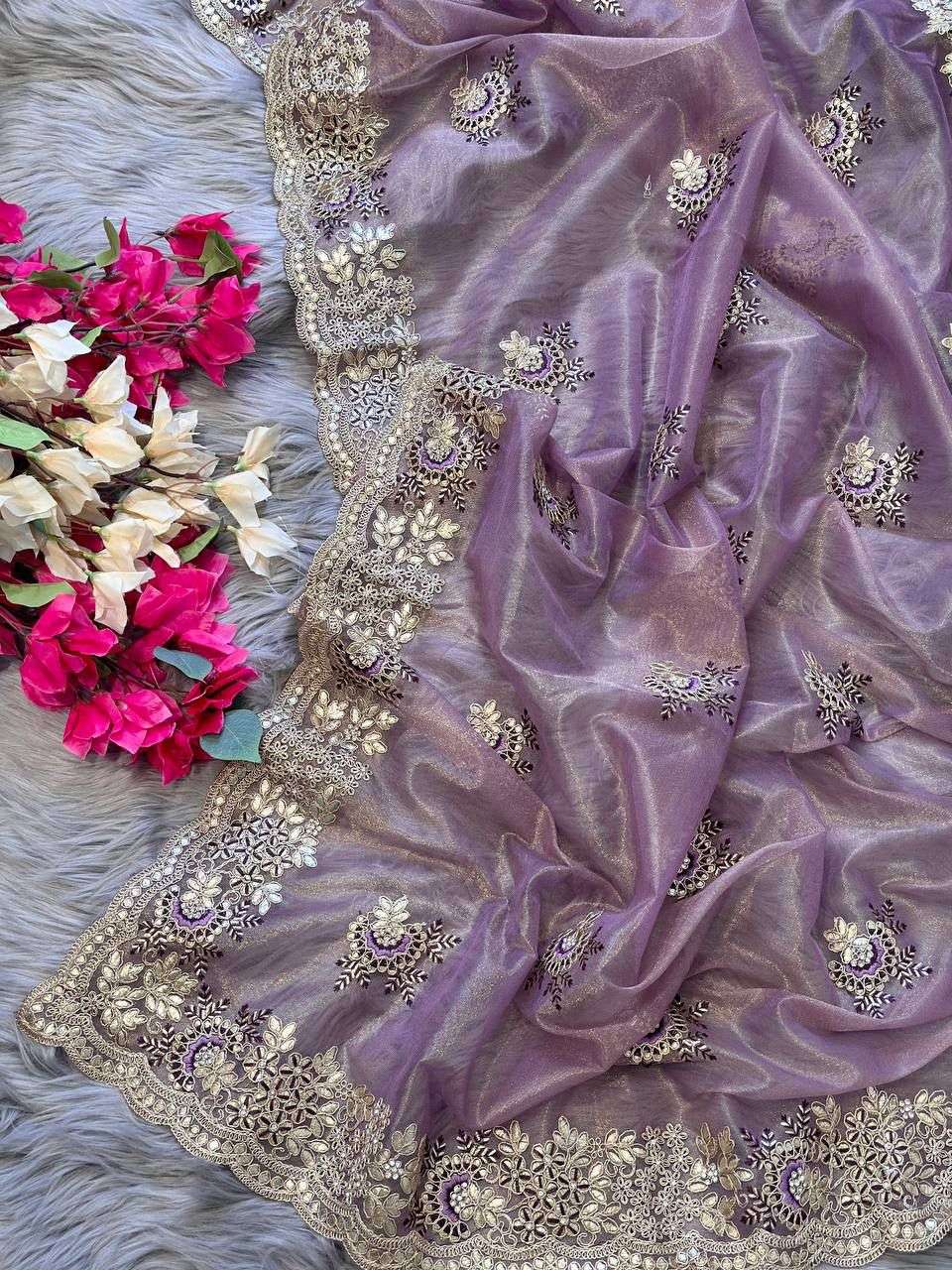 shravani designer Pure Tissue silk saree in a solid color with  embroidery viscos thread work 