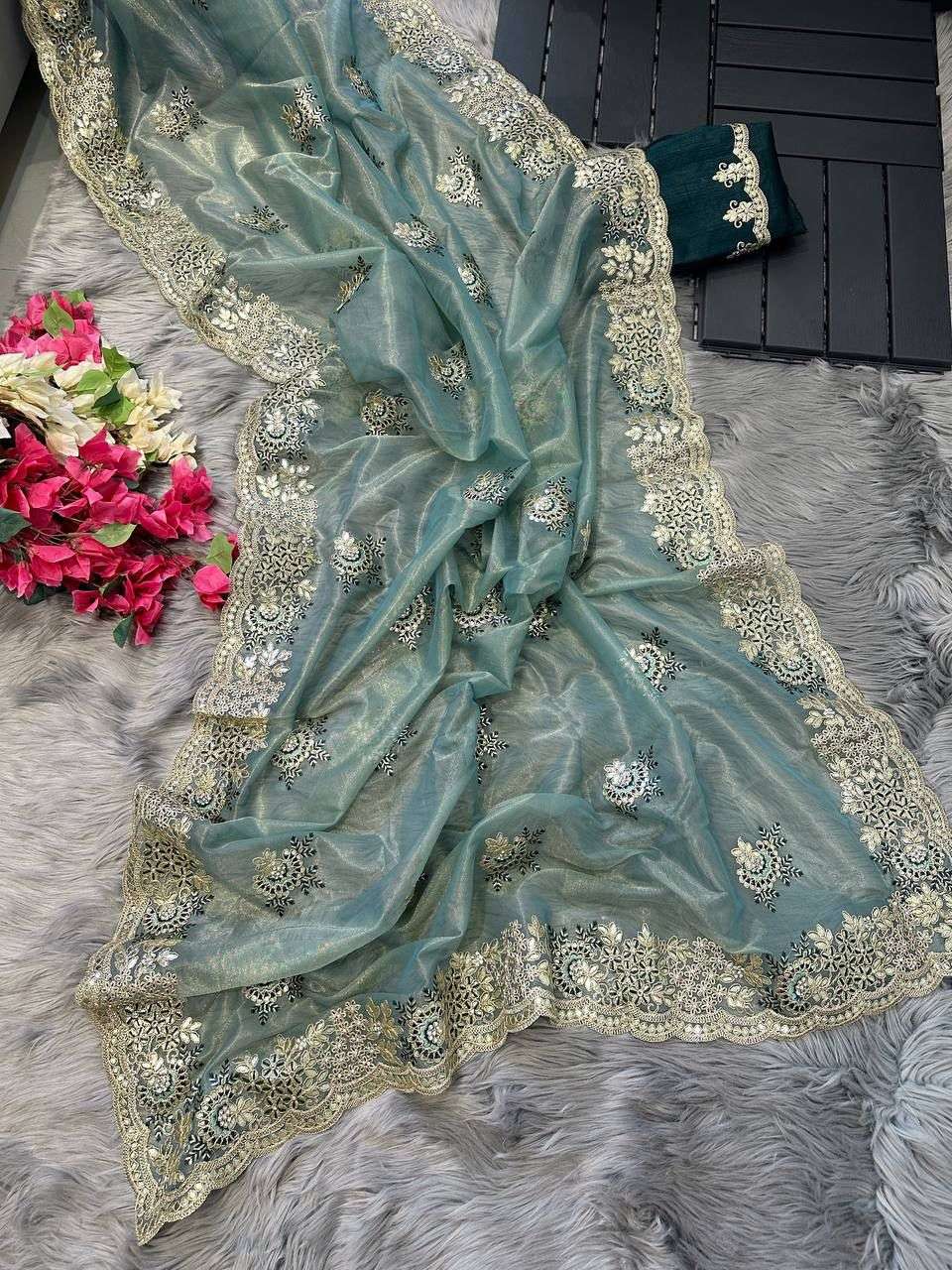 shravani designer Pure Tissue silk saree in a solid color with  embroidery viscos thread work 